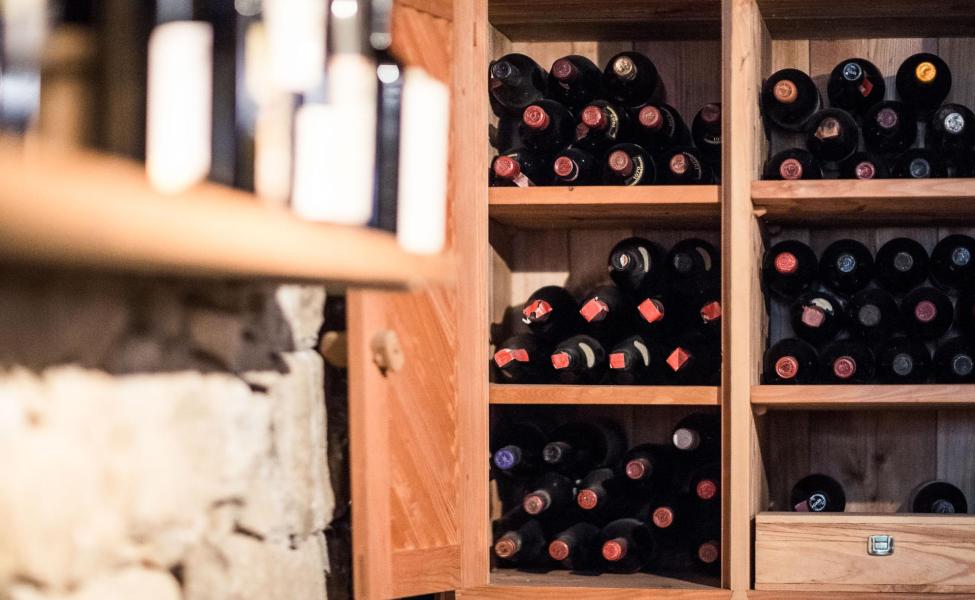 A shelf full of wine bottles